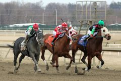 Bullet Butch with Frankie Pennington Rex Qwon Do with Edwin Rivera and Ruffy with Kendrick Carmouche in the stretch of Race 3 at Parx on March 7, 2022. Photo By: Chad B. Harmon