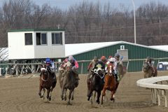 The final turn of Race 7 at Parx on March 7, 2022. Photo By: Chad B. Harmon
